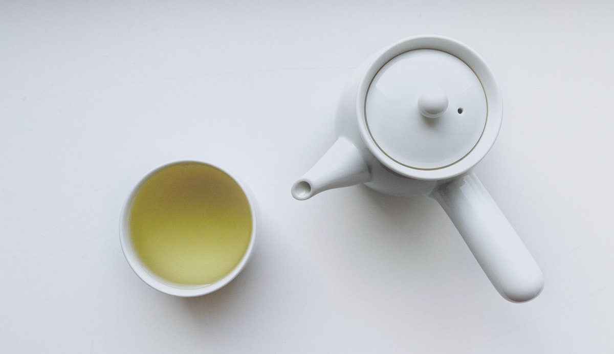 Fine porcelain teapot and mug